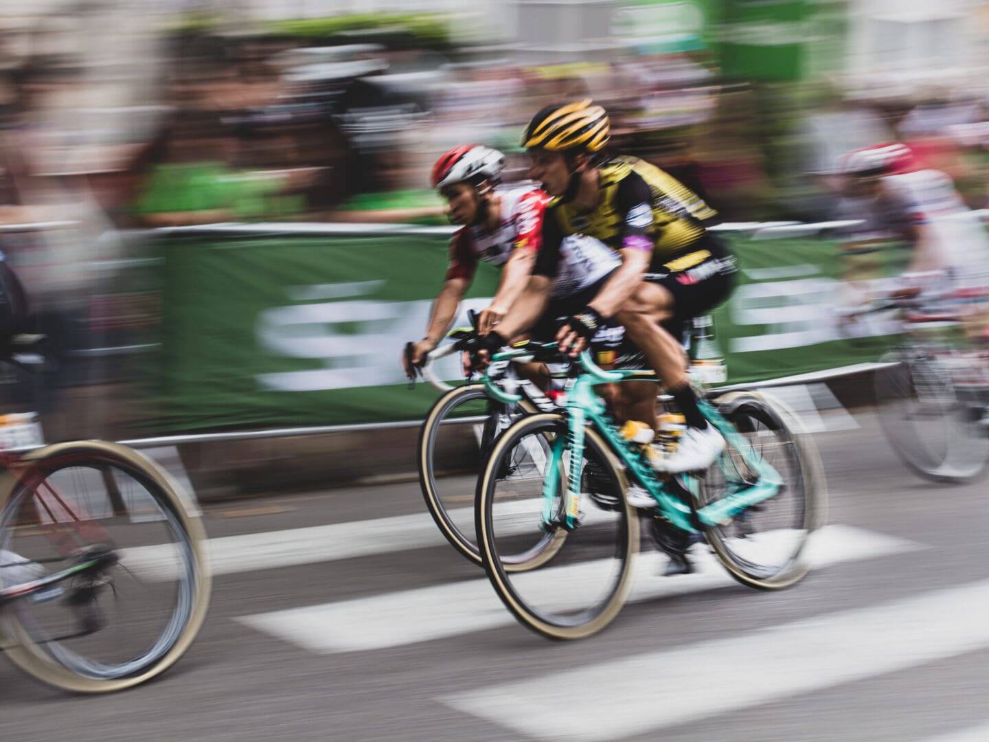 Cyclists racing in a fast-paced competition.